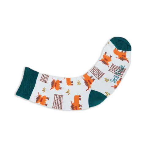 An image of a White Highland Cow calf length sock by Doris & Dude