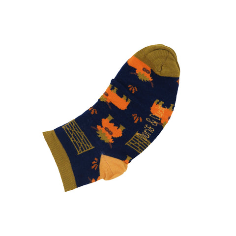 An image of a Navy Highland Cow  ankle length sock by Doris & Dude