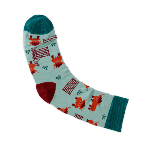 An image of Mint Highland Cow, calf-length sock by Doris & Dude